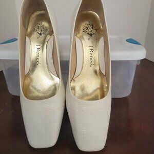 White square-toed lizard pumps.